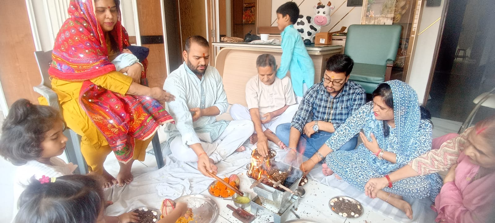 Family performing holy sanskar in Meerut